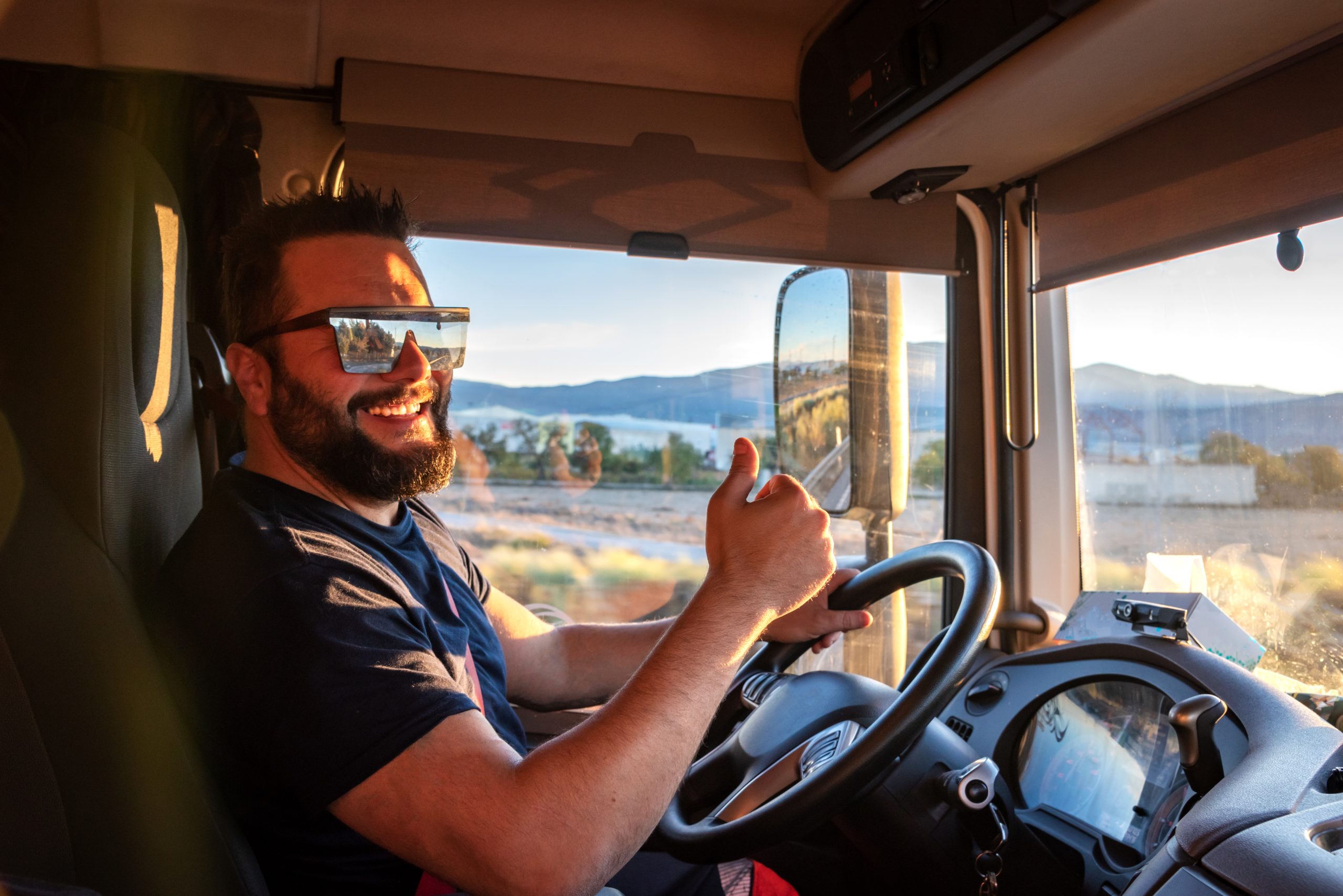 a Truck Driver gives a Thumbs up
