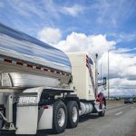 A Fuel Truck driving on the interstate.