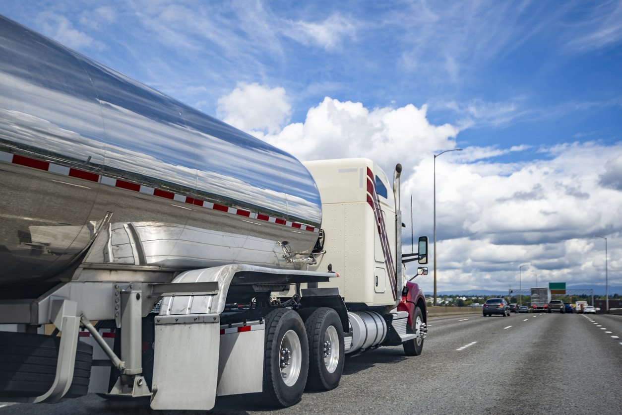 A Fuel Truck driving on the interstate.