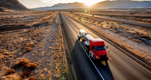Red Cab Tanker Truck Driving Down Interstate Seventy in Utah